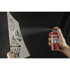 Repositionable Spray Adhesive in use on a stencil